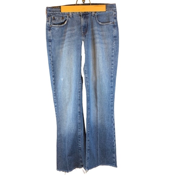 Levi's 515 Mid Rise Boot Cut Size 8 Medium Wash Raw Hem Ladies Jeans - Picture 2 of 12